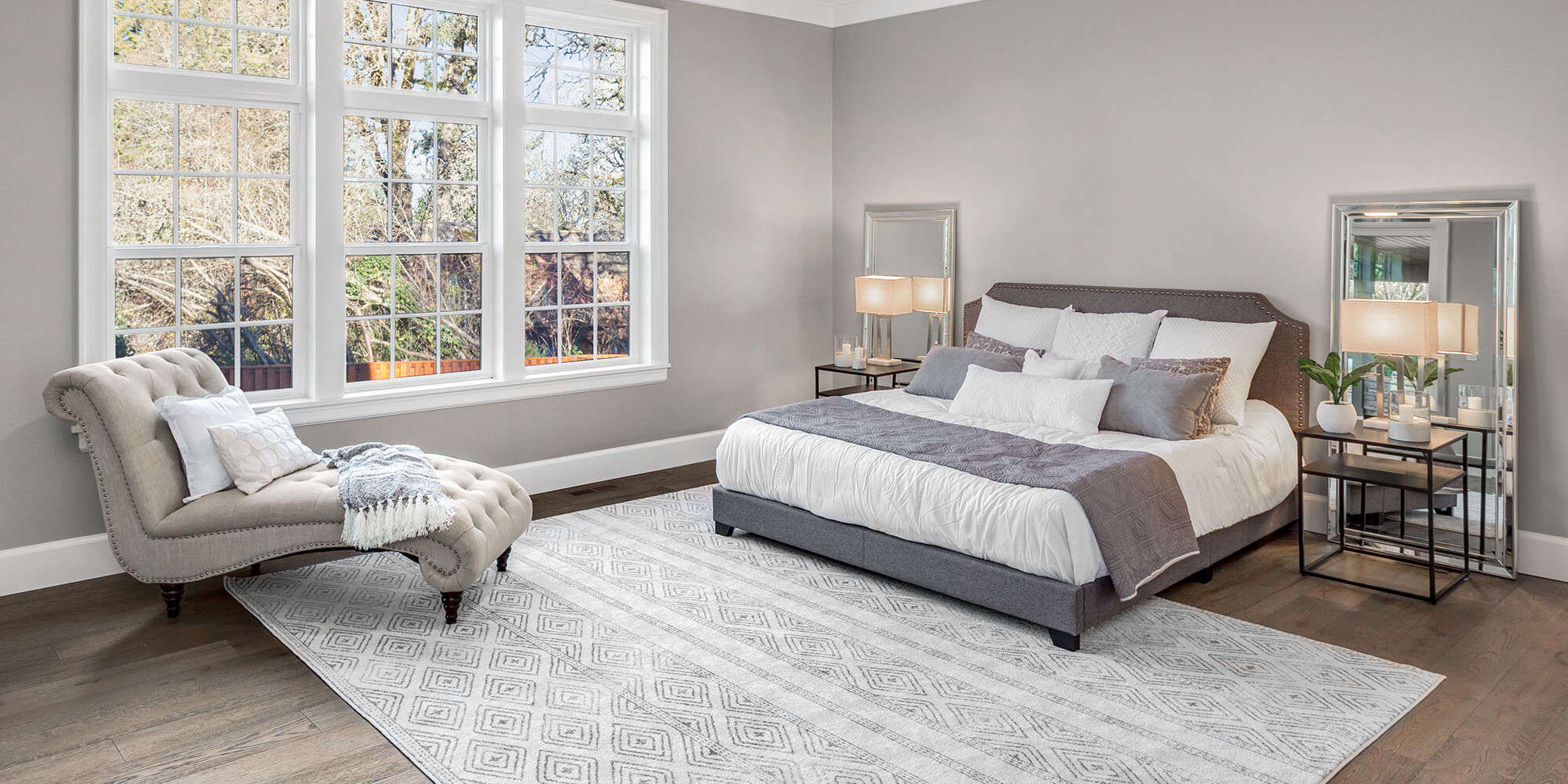 Bedroom with a large rug