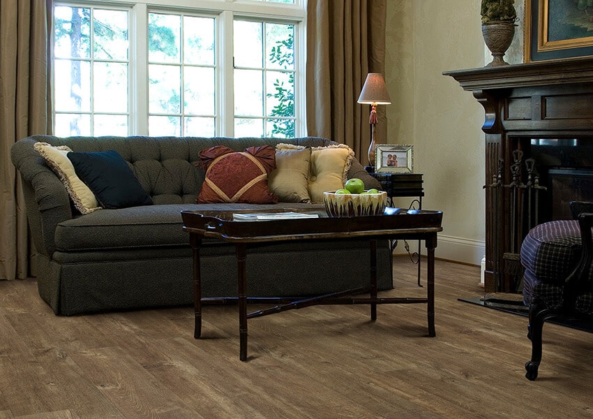 A hardwood floor in a furnished living room