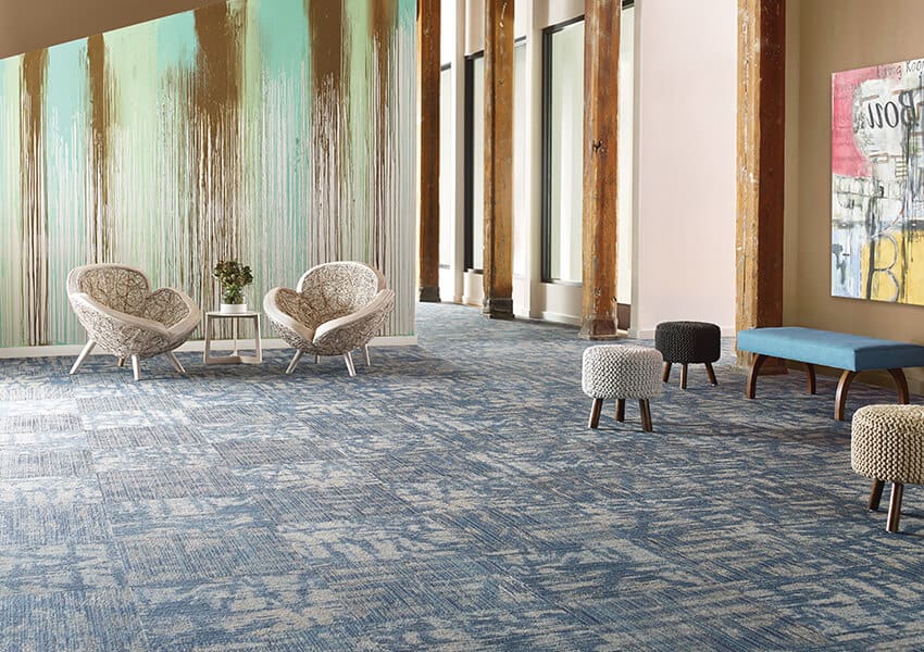 Wildstyle carpeting beneath chairs in a wide area
